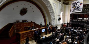 Venezuelan opposition leader and self-proclaimed interim president Juan Guaido (C at left) conducts a session of the National Assembly in Caracas on April 9, 2019. - The Permanent Council of the Organization of American States (OAS) will hold a special meeting on Tuesday to consider if it accepts Guaidos envoy as Venezuelas special  representative. (Photo by Federico Parra / AFP)        (Photo credit should read FEDERICO PARRA/AFP/Getty Images)