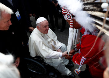 Pope Francis is welcomed after arriving at Edmonton International Airport, near Edmonton, Alberta, Canada July 24, 2022. REUTERS/Guglielmo Mangiapane