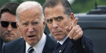 President Joe Biden talks with his son Hunter Biden as he arrives Delaware Air National Guard Base in New Castle, Del., Tuesday, June 11, 2024. (AP Photo/Manuel Balce Ceneta)