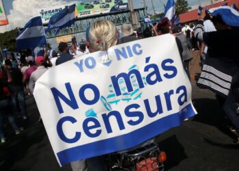 A demonstrator holds a banner reading "No more censorship" during a protest against police violence and the government of Nicaraguan President Daniel Ortega in Managua, Nicaragua April 23, 2018. REUTERS/Oswaldo Rivas