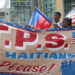 MIAMI, FL - MAY 13:  People protest the possibility that the Trump administration may overturn the Temporary Protected Status for Haitians in front of the U.S. Citizenship and Immigration Services office on May 13, 2017 in Miami, Florida.  50,000 Haitians have been eligible for TPS and now the Trump administration has until May 23 to make a decision on extending TPS for Haitians or allowing it to expire on July 22 which would mean possibly deportation for the current TPS holders.  (Photo by Joe Raedle/Getty Images)