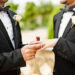 Gay Couple Exchanging Rings at Wedding